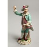 A 19TH CENTURY FURSTENBERG PORCELAIN FIGURE OF A MAN. Mark in blue, 5.5ins high.