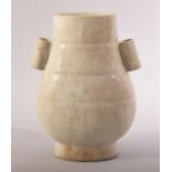 A CHINESE SONG STYLE TWIN HANDLE VASE. 20cm high