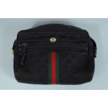 A GUCCI LEATHER BAG 9ins long.