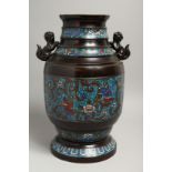 A LARGE CHINESE BRONZE AND CLOISONNE ENAMEL VASE with lion handles. 15ins high.