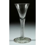 A GEORGIAN WINE GLASS with tapering bowl. 5.5ins high.