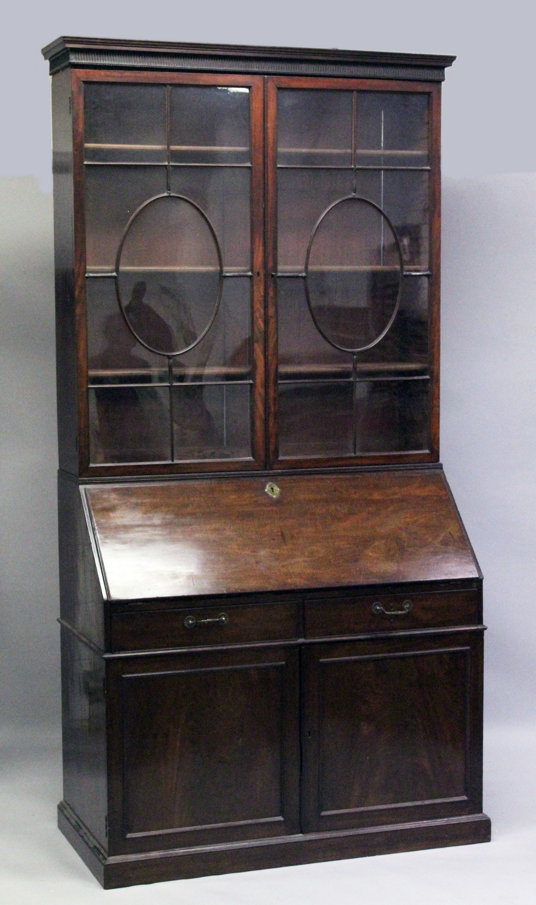 A GOOD GEORGE III MAHOGANY BUREAU BOOKCASE, the top with cornice over a pair of glazed doors with