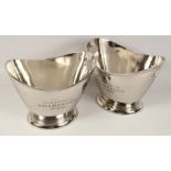 A PAIR OF OVAL TWO HANDLED CHAMPAGNE WINE COOLERS. 13ins wide.