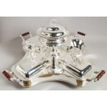 A SUPERB LARGE PLATED LAZY SUSAN with tureens, four vegetable dishes, cruet, salt and pepper and
