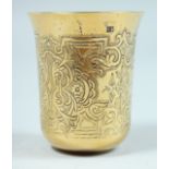 A RUSSIAN SILVER GILT BEAKER with engraved decoration. Mark:84, B. C. over 1869. 2.5ins high.