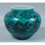 A CHINESE TURQUOISE GROUND BOWL decorated with dark blue lotus. 7.5ins diameter.