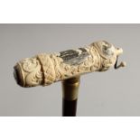 A BONE HANDLED WALKING STICK CARVED AS A SAILING SHIP. 35ins long