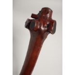 A POLYNESIAN CLUB with carved handle. 38ins long.