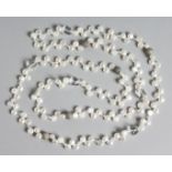 A PEARL AND CRYSTAL BEAD NECKLACE. 36ins long.