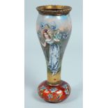 A GOOD FRENCH ART DECO ENAMEL VASE, a young girl with flowers. 19cm high.