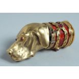 A GOOD RUSSIAN SILVER GILT AND ENAMEL DOG'S HEAD SNUFF BOX, the head with three fox cubs, set with