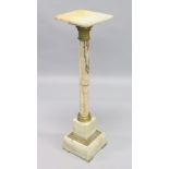 A GOOD ONYX AND BRASS SQUARE TOP COLUMN, the base on bracket feet. 3ft 3ins high, top 10ins square.