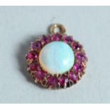 A RUBY AND OPAL CIRCULAR PENDANT.