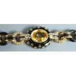A GOOD FARRONE 18CT GOLD AND ENAMEL SET with a yellow sapphire and diamond.