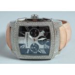 A MAUBOUSSIN DIAMOND SET WRISTWATCH with leather strap. No. 0264 R 529