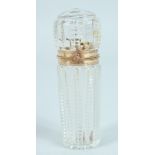 A GOOD CRYSTAL, GOLD MOUNTED, SCENT BOTTLE 3.25ins long.