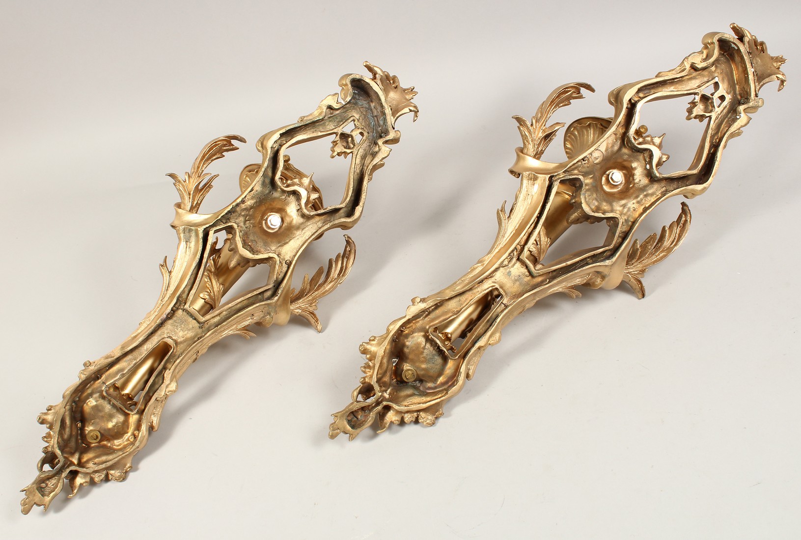 A GOOD PAIR OF GILT BRONZE SCONCES, AS TORCHES with acanthus scrolls. - Image 3 of 3