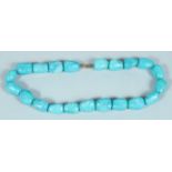 A TURQUOISE NECKLACE.