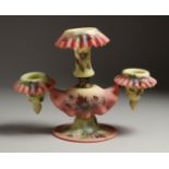 A GOOD BURMESE GLASS THREE-LIGHT CANDLESTICK painted with flowers. 7ins high.