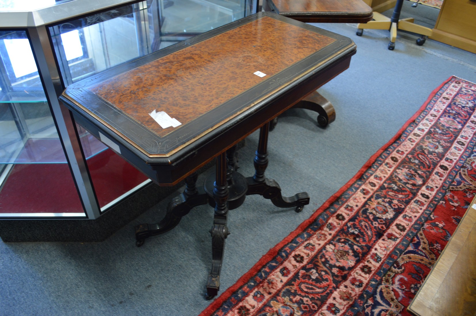 A VICTORIAN EBONISED AND BURRWOOD FOLD OVER CARD TABLE. 3ft wide x1ft 6ins deep x 2ft 5.5ins high