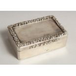 A GOOD WILLIAM IV SILVER TABLE SNUFF BOX, engine turned with fluid border. 3.5ins long, 2.25ins