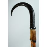 A SWISS WALKING STICK "MONTREX" with horn handle and hoof and spike. 37ins long.