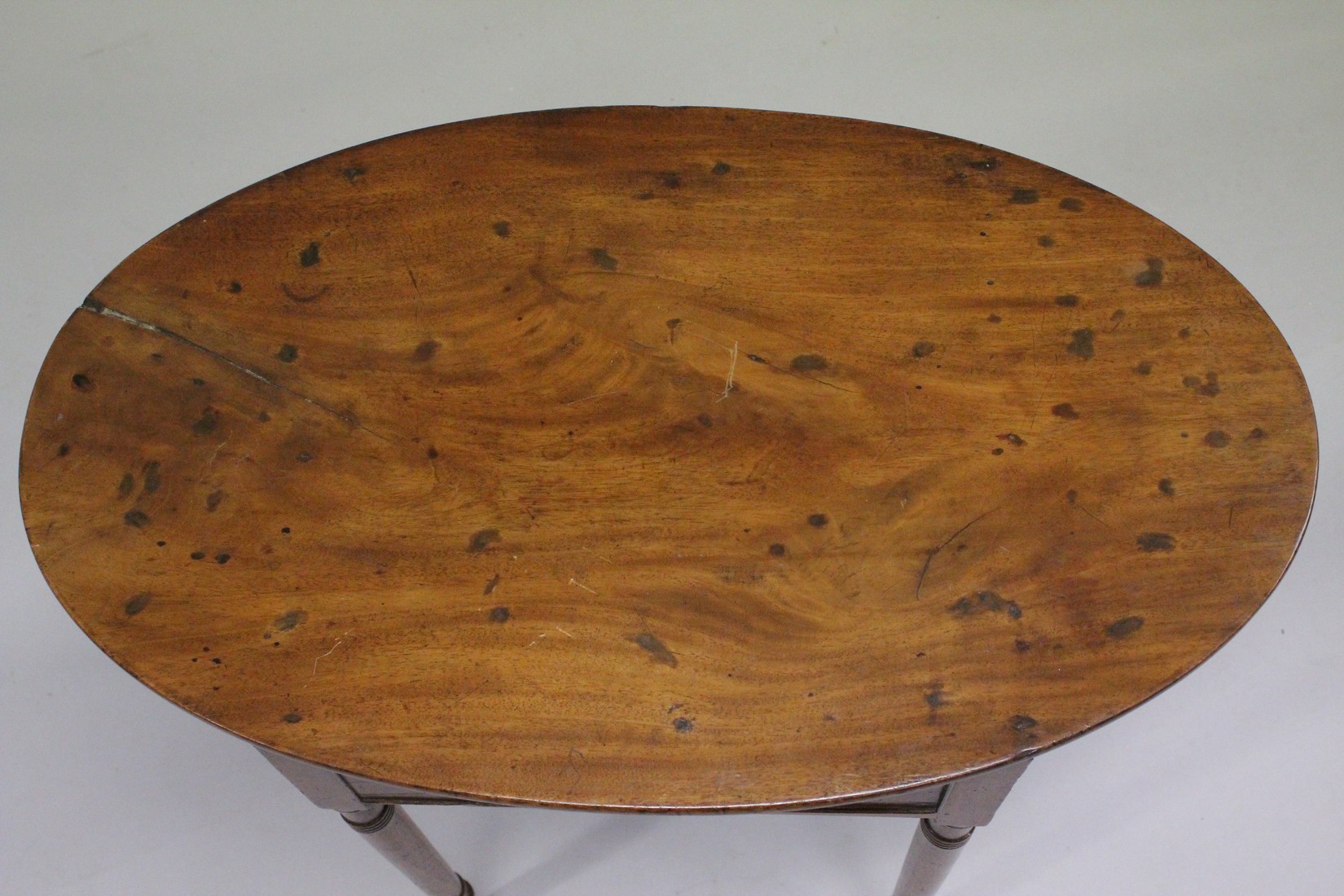 A 19TH CENTURY IRISH YEW WOOD OVAL TABLE sold by HODGES & SON, DUBLIN with plain oval top, single - Image 2 of 5