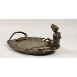 AN ART DECO OVAL DISH with a nude and a lizard. 14ins long.
