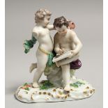 A SMALL MEISSEN GROUP OF TWO CHERUBS. Mark in blue (A/F) 4.5ins high.