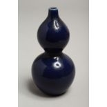 A SMALL CHINESE BLUE DOUBLE GOURD VASE. 4.5ins high.