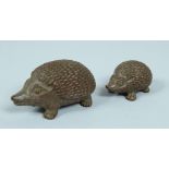 TWO JAPANESE BRONZE HEDGEHOGS.