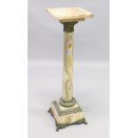 A GOOD ONYX AND BRASS SQUARE TOP COLUMN, the base on claw feet. 3ft 7ins high, top 1ft square.