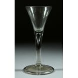 A GEORGIAN WINE GLASS with tapering bowl. 6ins high.