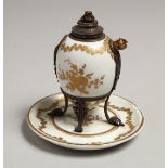 A 19TH CENTURY SEVRES PORCELAIN AND ORMOLU EGG SHAPED STAND. 4.5ins diameter.