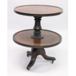 A GEORGIAN MAHOGANY CIRCULAR TWO TIER DUMB WAITER centre turned support, ending in tripod legs