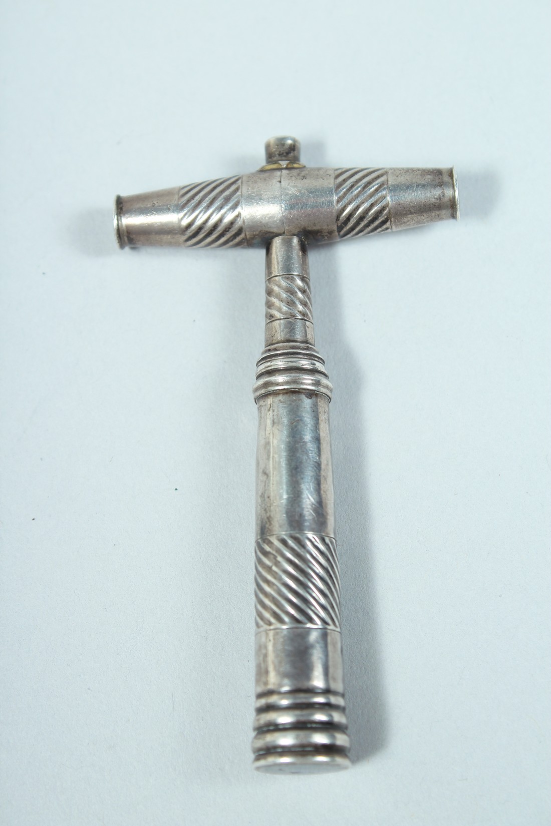 A SMALL SILVER CORKSCREW. 3ins long. - Image 2 of 3