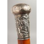 A MALACCA CANE with Chinese silver handle. 35ins long.