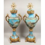 A LARGE PAIR OF SEVRES STYLE PORCELAIN VASES AND STANDS with classical scenes with ormolu mounts