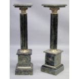 A PAIR OF MARBLE COLUMNS with square top.
