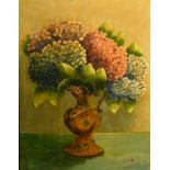 Jiva, a still life of flowers in a vase, oil on canvas laid down, signed, 21" x 16" (53 x 41cm).