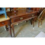 A Victorian mahogany two drawer side table.