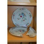 A pair of Chinese famille rose plates (one broken).
