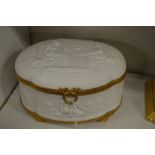 A Continental ormolu mounted porcelain box and cover.