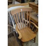 A large Victorian style kitchen chair and a painted rocking chair.