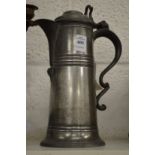 A pewter flagon.