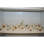 A collection of crested china.