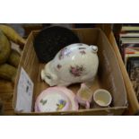 A large pottery piggie bank and other items.