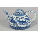 A LARGE CHINESE BLUE AND WHITE PORCELAIN TEAPOT AND COVER, the body painted with dragons, the