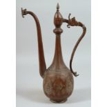 A FINE 18TH CENTURY PERSIAN SAFAVID COPPER EWER, with stylised dragon shaped handle and spout, the