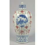A VERY RARE, FINE BLUE AND WHITE PORCELAIN VASE and associated cover, further decorated in iron red,